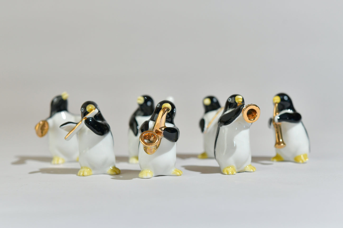 Set of 7 Pottery Penguins Orchestra Collection